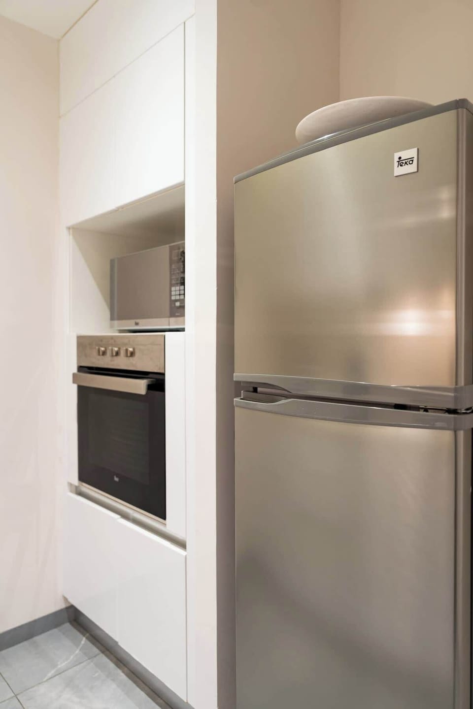 Despite being a studio apartment, you will have a refrigerator and oven.