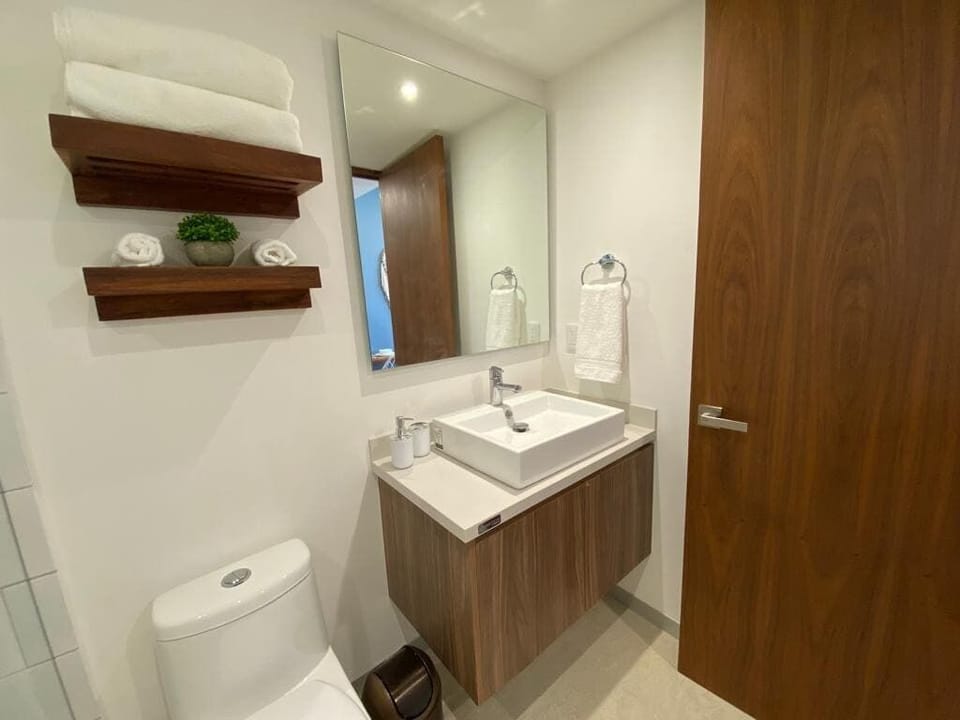 Modern bathroom with sleek design and fresh, clean finishes.