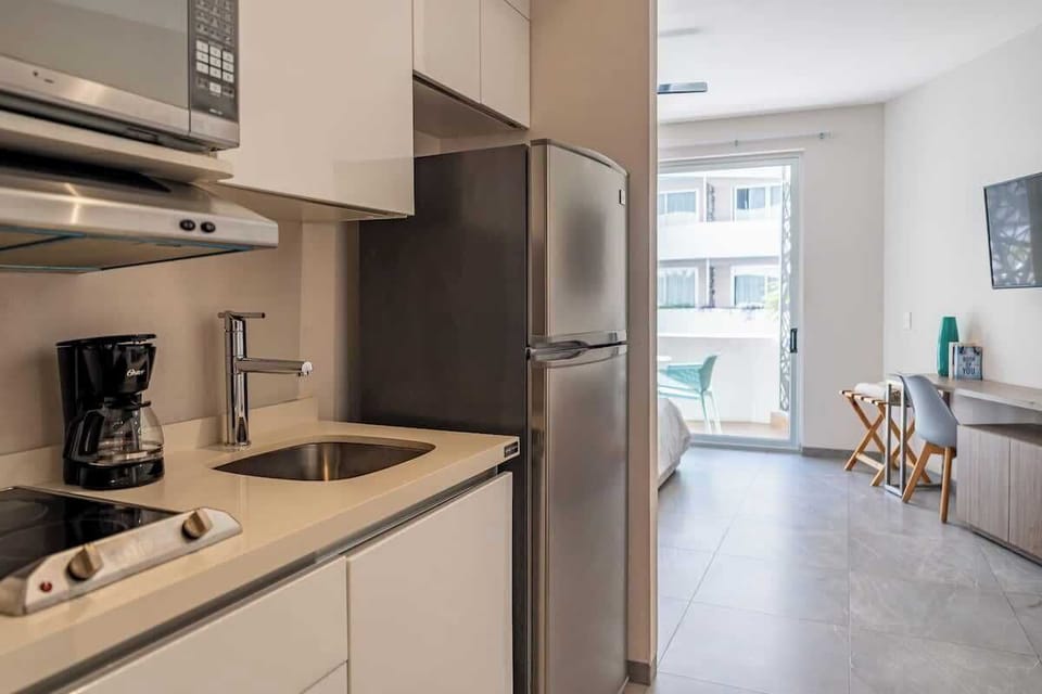 Modern kitchenette - ready for your culinary creations.