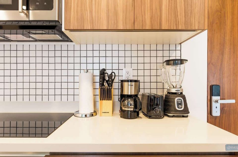Fully equipped kitchen with modern appliances.
