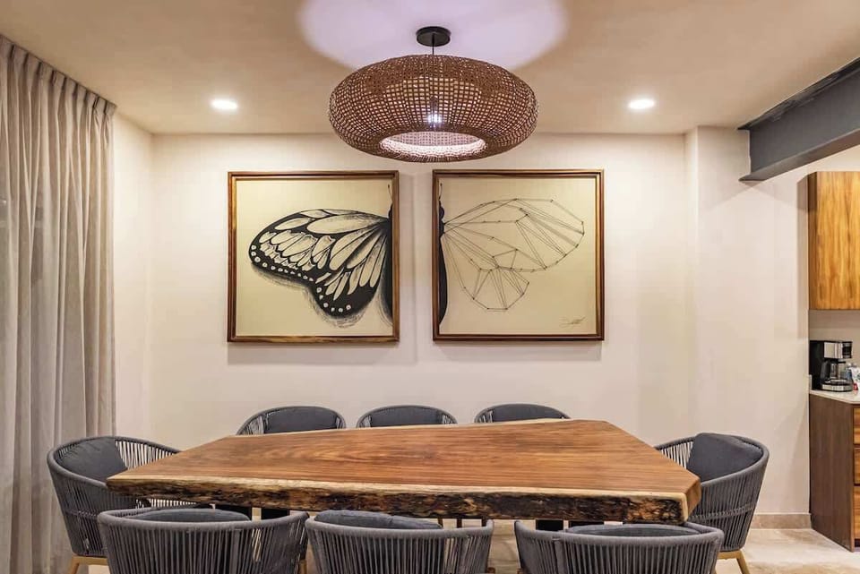 A table that seats 8 people, plus high chairs and lots of design