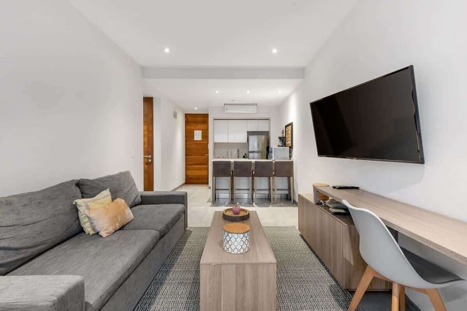 Stay cool indoors with your favorite shows, just meters from the water