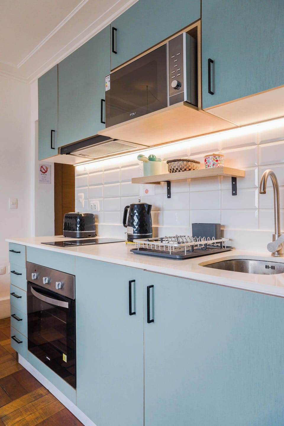 Sleek, modern kitchen with all essentials for a comfortable stay in the heart of Chile.