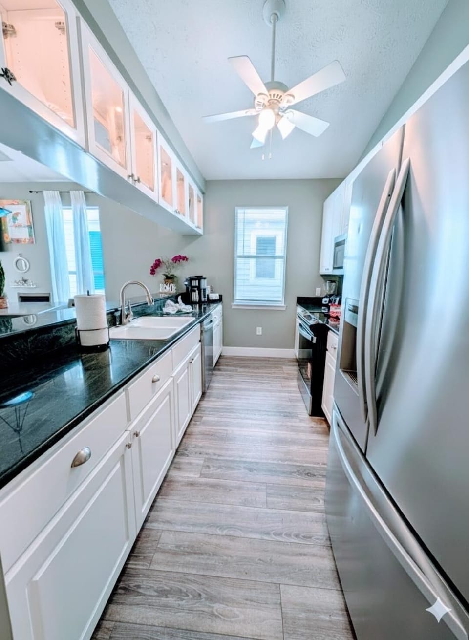 Bright, modern kitchen with New sleek stainless steel appliances