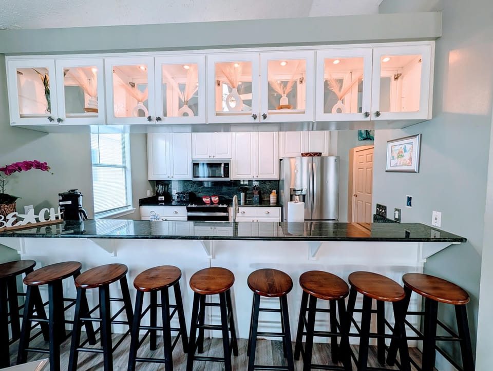 Bright, open kitchen with ample seating for gatherings