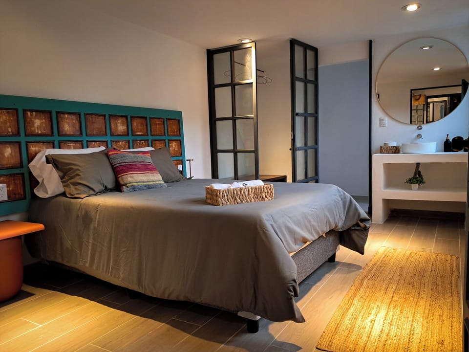 Deluxe Quadruple Room, Courtyard View | Down comforters, minibar, blackout drapes, soundproofing