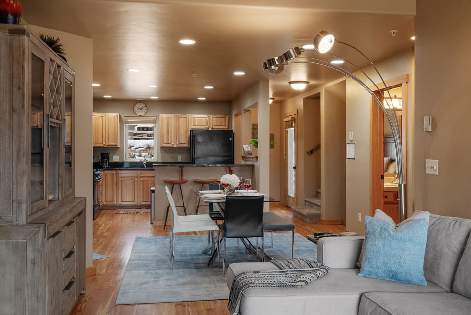 Living room: Fireplace, SmartTv, and sofa