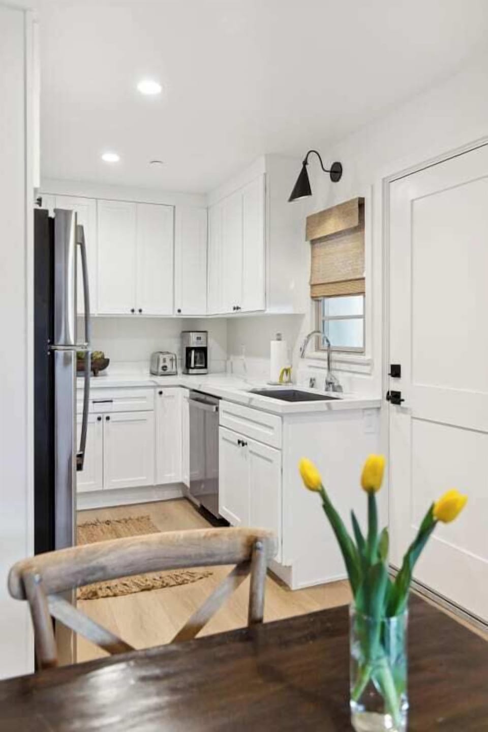 Full kitchen: Coffee drip, fridge, stove/oven, plates and utensils, dishwasher