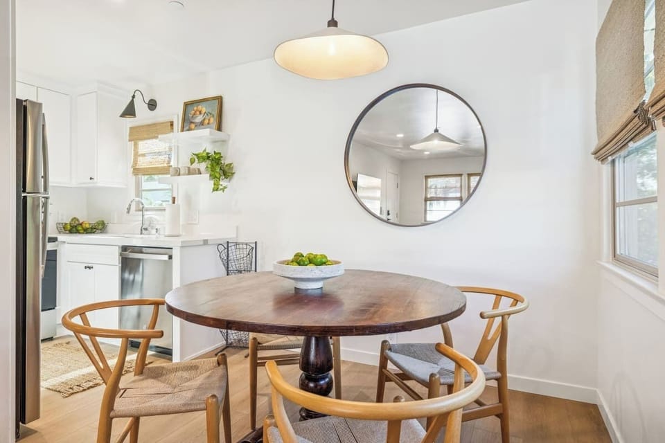 Bright dining area with seating for 4