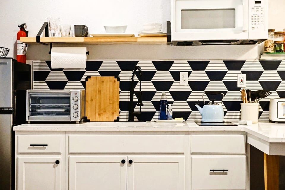 Savor the joy of cooking in a modern kitchen where every meal feels like an experience