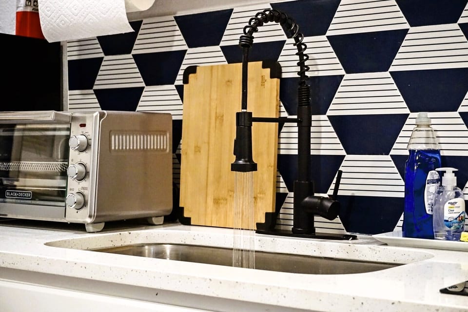 Enjoy the process of preparing meals in a kitchen designed to inspire creativity and connection