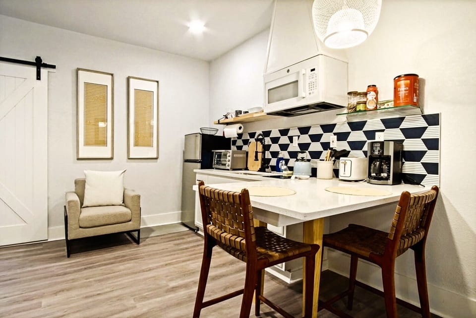 Gather around the table and enjoy the cozy atmosphere of a dining space designed for togetherness