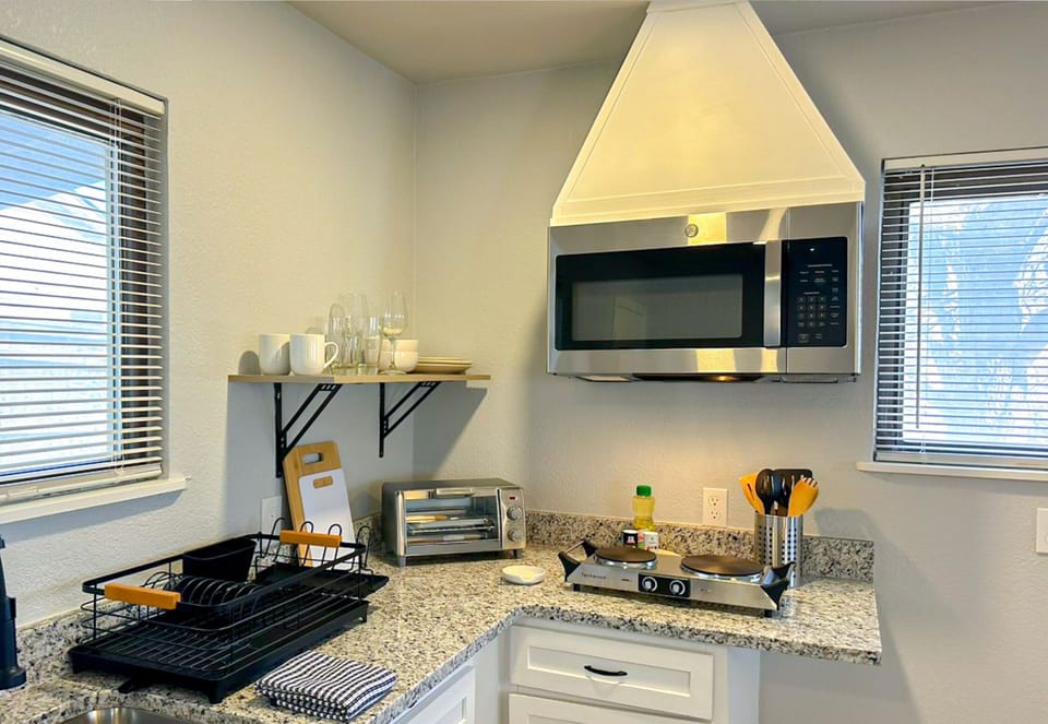 A bright kitchen and dining area create a welcoming space for meals and conversation