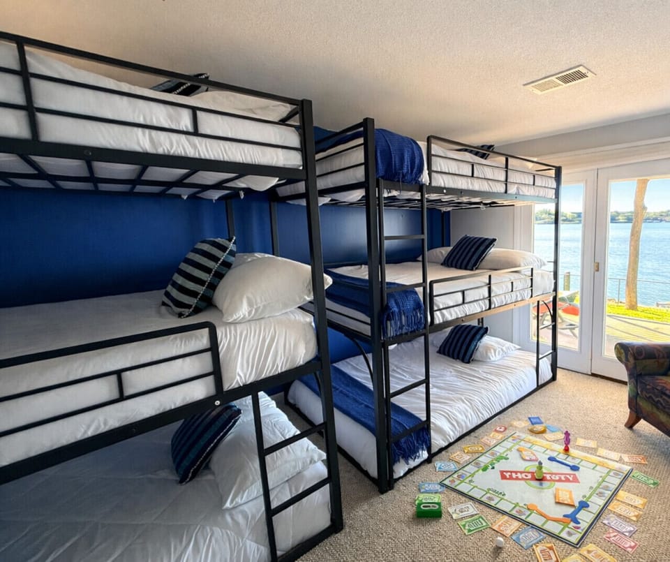 Expansive bunk room designed for comfort and group stays with plenty of sleeping space