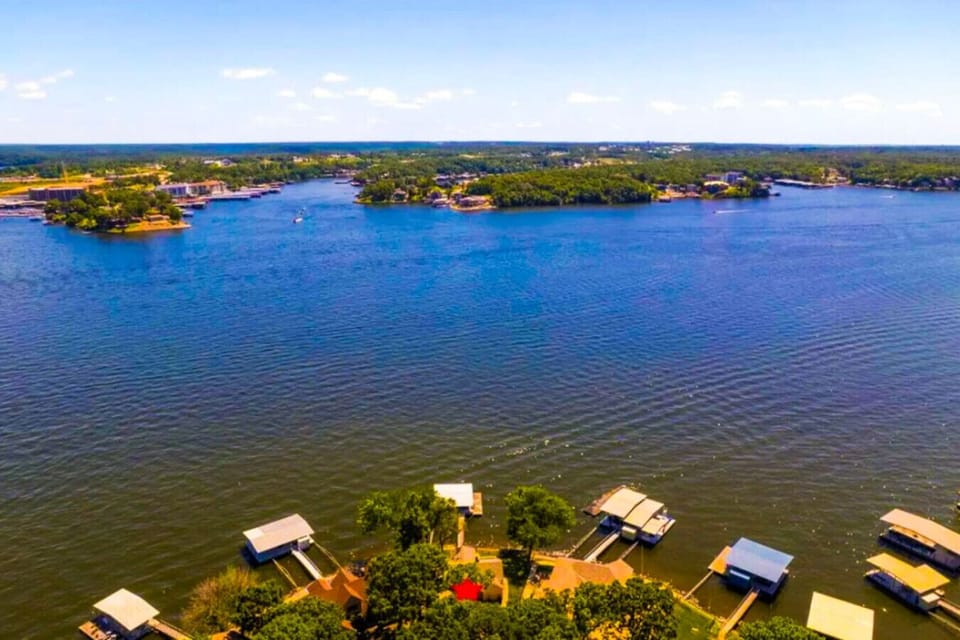 Soak in breathtaking panoramic lake views from this perfect waterfront escape! With wide-open water all around and easy dock access, it’s an ideal spot for boating, swimming, and unforgettable sunsets. Your peaceful lakeside getaway starts here.