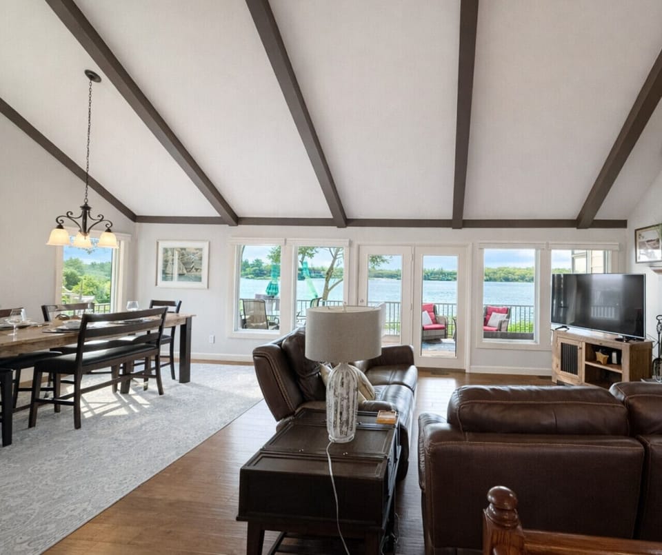 Relax in the spacious living area while taking in breathtaking main channel views