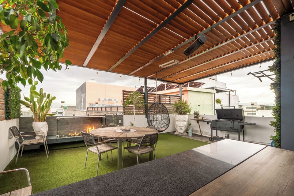 Private terrace panoramic, facing city. Fire pit on