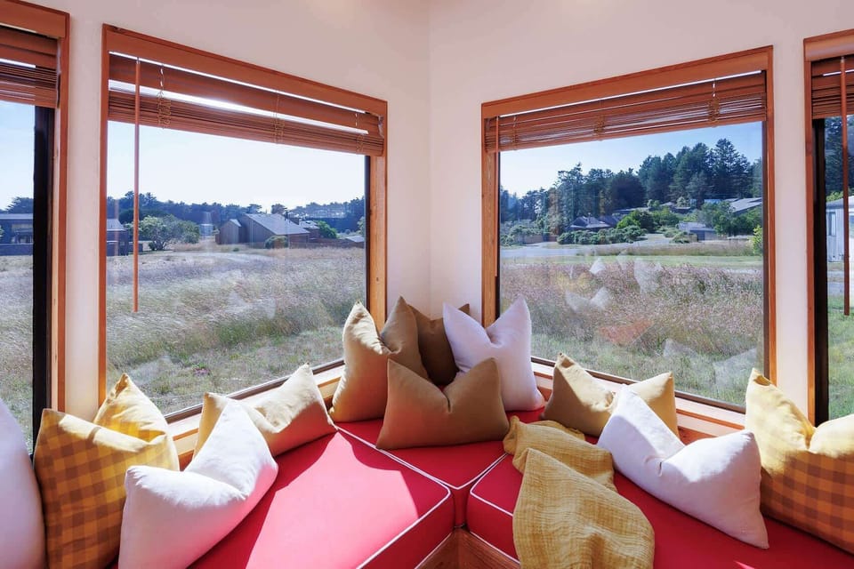 Cozy living room with lots of natural light and gas fireplace