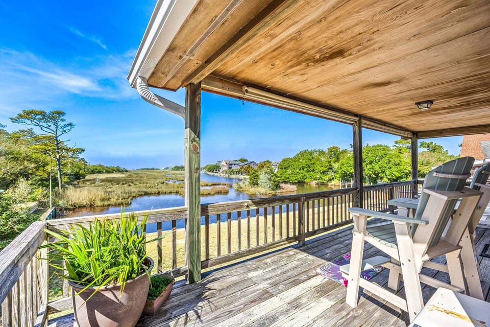 Back Deck: The back deck provides a relaxing place to sip morning coffee, watch boats drift by, or unwind as the sun sets over the sound.