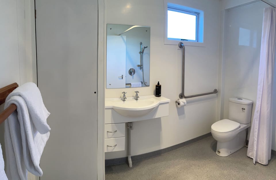 Two Bedroom Patio | Bathroom | Shower, hair dryer, towels