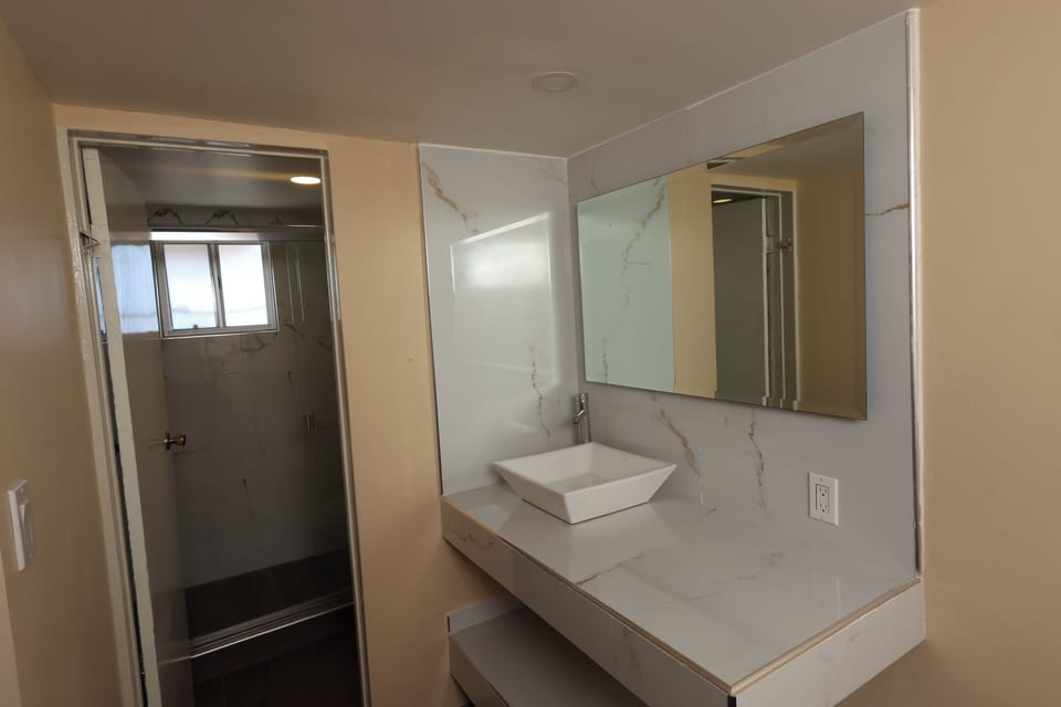 Shower, towels, soap, shampoo