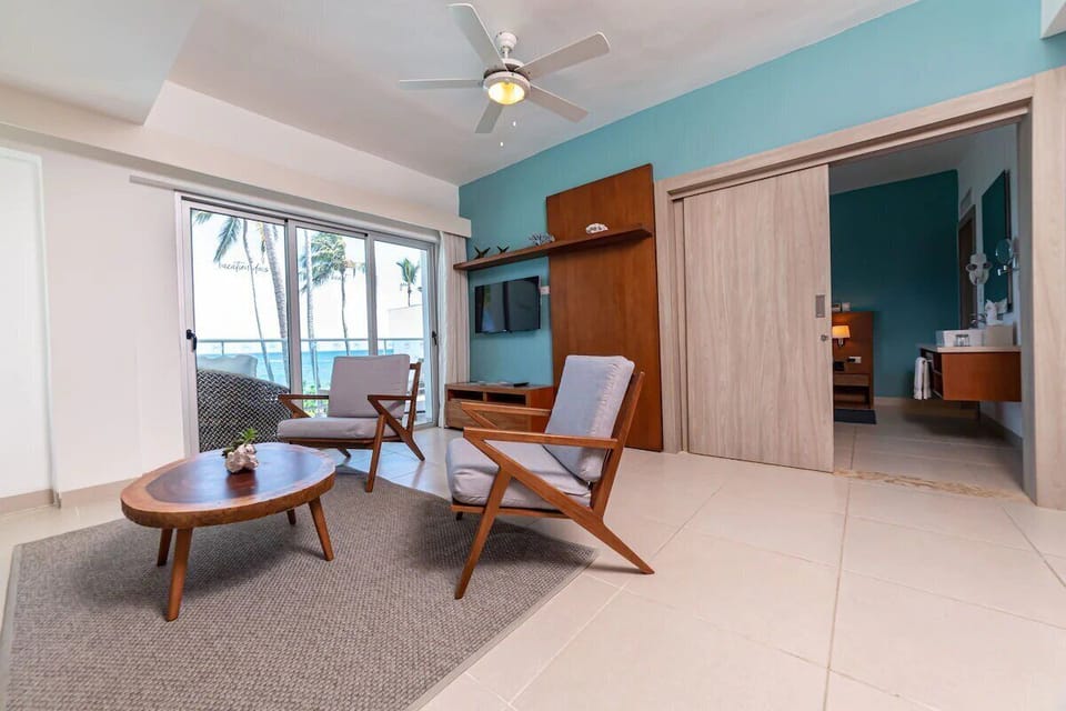 Luxury Suite, Balcony, Sea View | In-room safe, blackout drapes, iron/ironing board, bed sheets