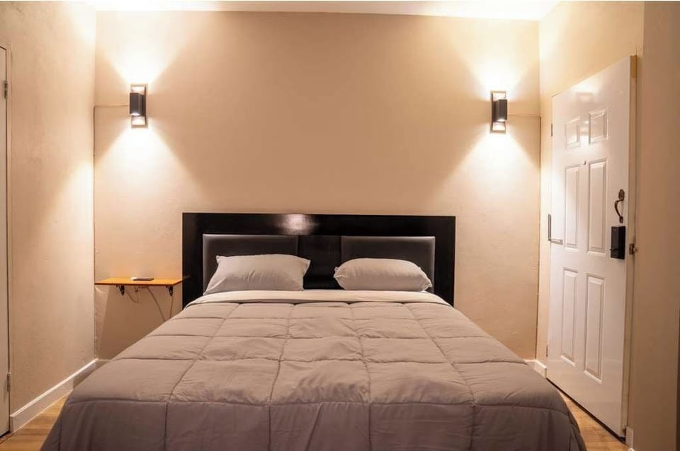 Premium bedding, pillowtop beds, laptop workspace, iron/ironing board