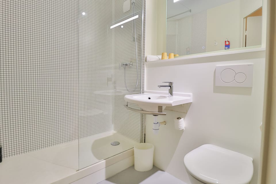 Eco-friendly toiletries, hair dryer, towels