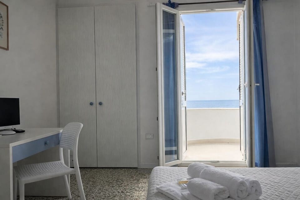 Double or Twin Room, Sea View | Desk, WiFi (free), bed sheets