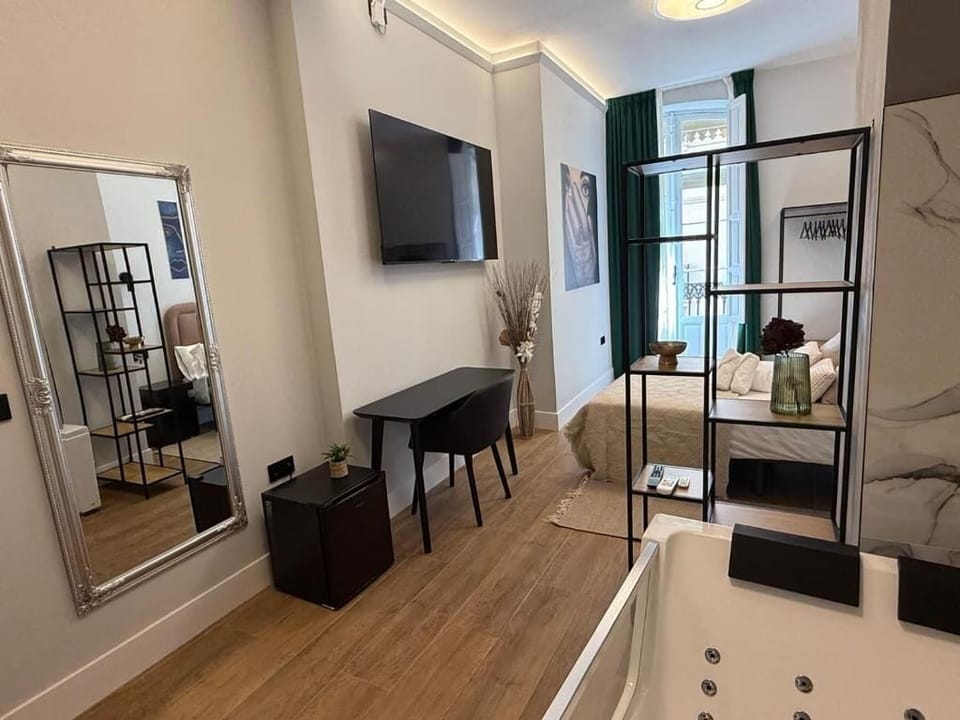 Deluxe Double Room, Balcony | In-room safe, blackout drapes, soundproofing, free WiFi