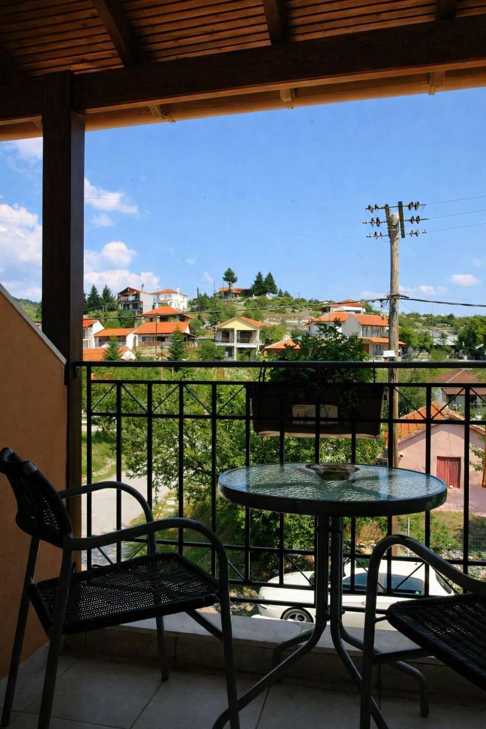 Balcony Seating Area with Open Views
Outdoor seating ideal for enjoying fresh air and village scenery.