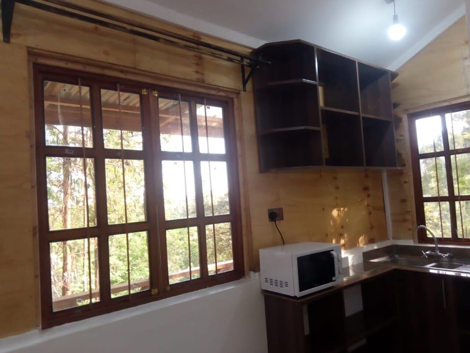 Deluxe Cottage, Balcony, Garden View | Private kitchen | Fridge, microwave, cookware/dishes/utensils