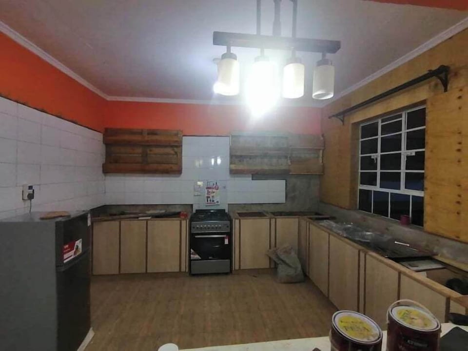 Deluxe Cottage, Balcony, Garden View | Private kitchen | Fridge, microwave, cookware/dishes/utensils