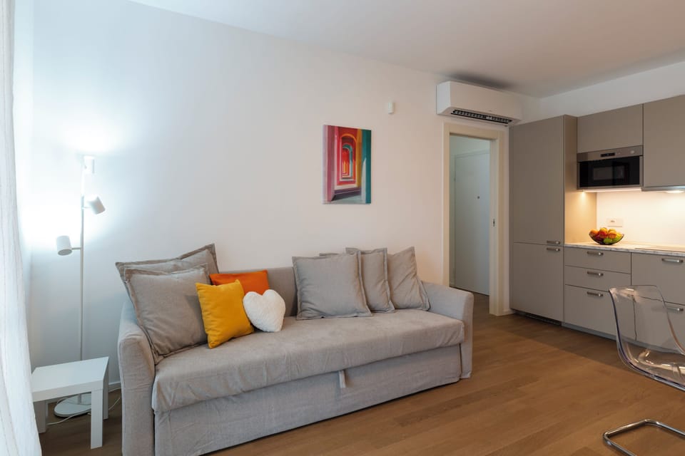 Deluxe Apartment | Living area | 43-inch Smart TV with digital channels