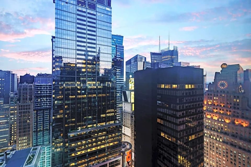 The Seagram Building, located at 375 Park Avenue in Midtown Manhattan, is an iconic skyscraper renowned for its sleek design and significant influence on modern architecture.