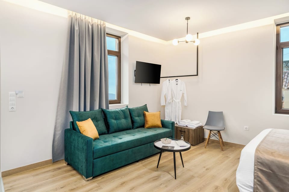 Comfy green sofa that can be transformed into a double bed