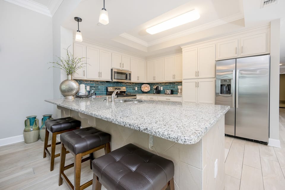 Condo, 3 Bedrooms | Private kitchen | Fridge, oven, coffee/tea maker