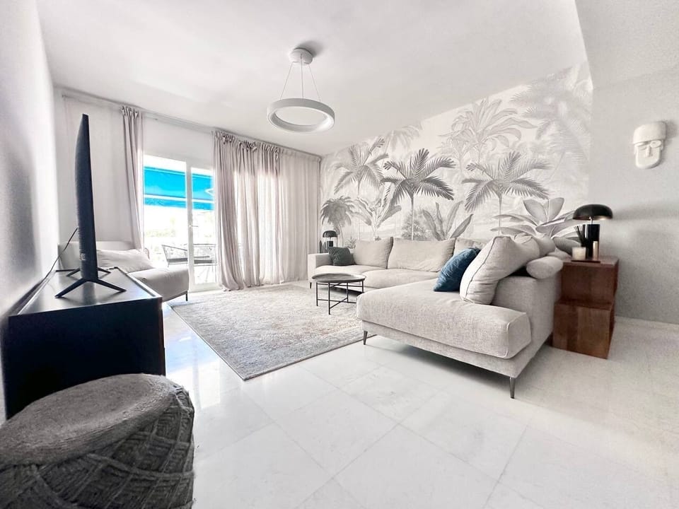 Family Apartment, Balcony, Pool View | Living area | Flat-screen TV