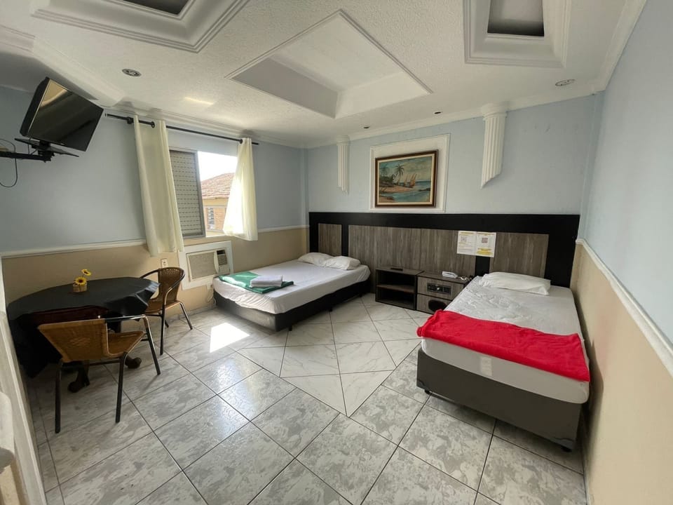 Standard Triple Room | Desk, free WiFi, bed sheets
