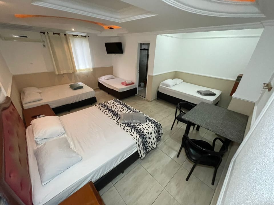 Standard Suite, Multiple Beds | Desk, WiFi (free), bed sheets