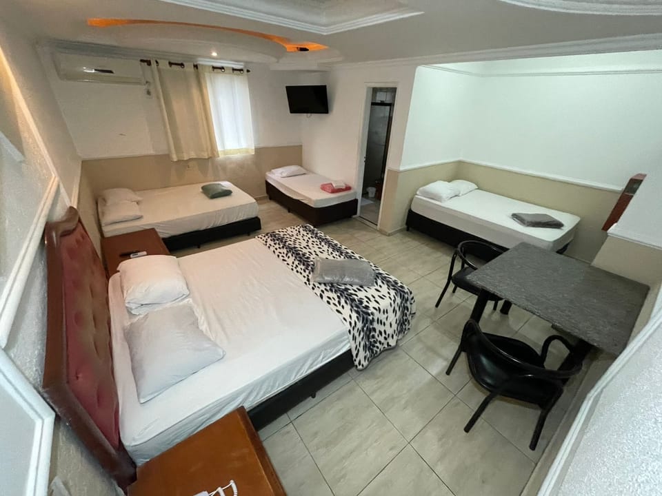 Standard Suite, Multiple Beds | Desk, WiFi (free), bed sheets