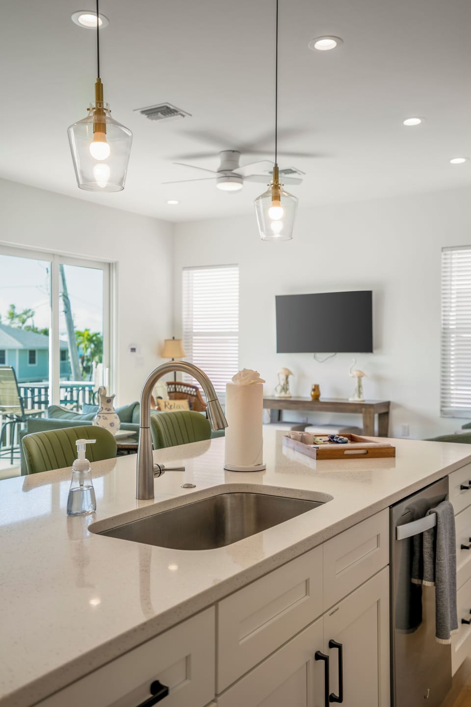 Blue Tides Kitchen : Cook comfortably in the fully stocked full kitchen with all the essentials - from pots/pans, baking sheets, cutting boards, blender, and more! 
