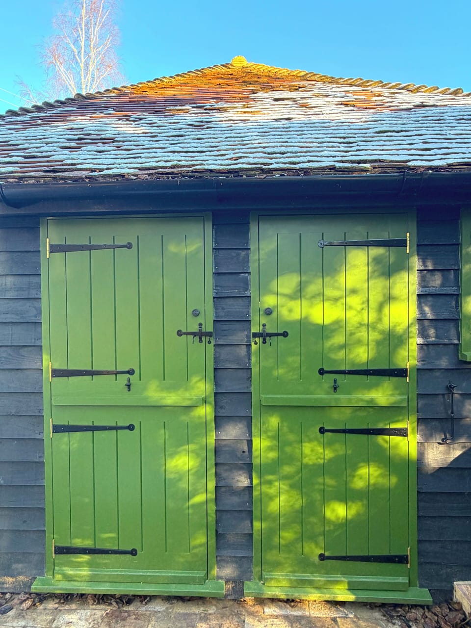 Fling open the barn doors and follow the brick path to your private wild garden