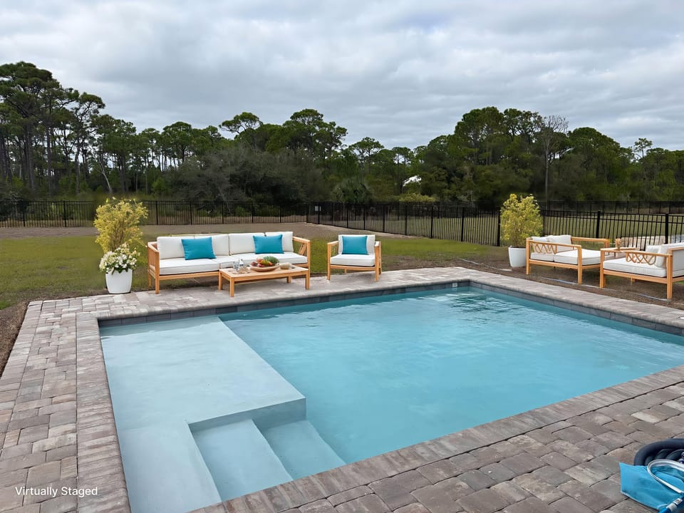 Unwind by your private pool with luxurious outdoor seating, perfect for soaking up sun or stargazing under endless skies.