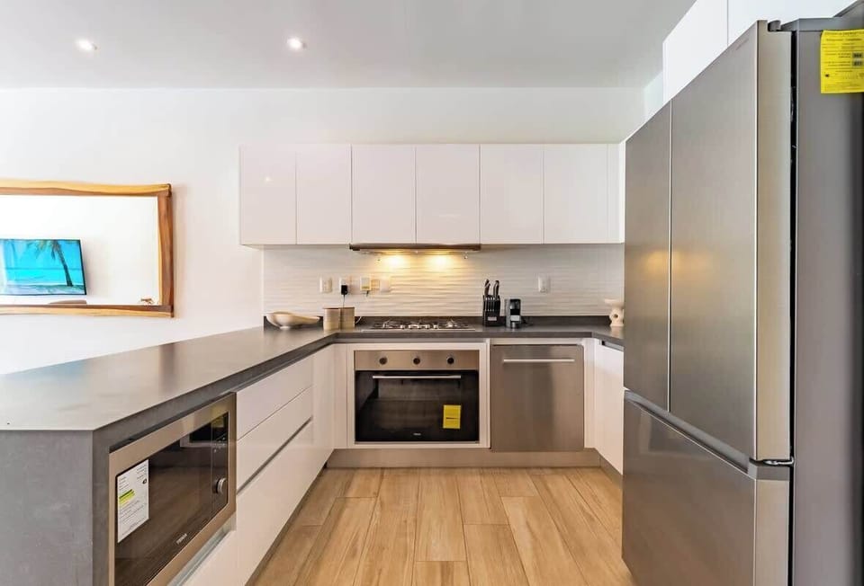 ‍ Cocina integral equipada con refrigerador, horno, estufa y utensilios. Pensada para quienes buscan comodidad y funcionalidad durante su estancia.