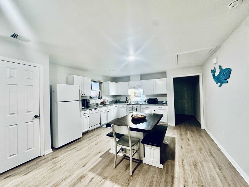 Gather and connect in the open kitchen with dining for 6
