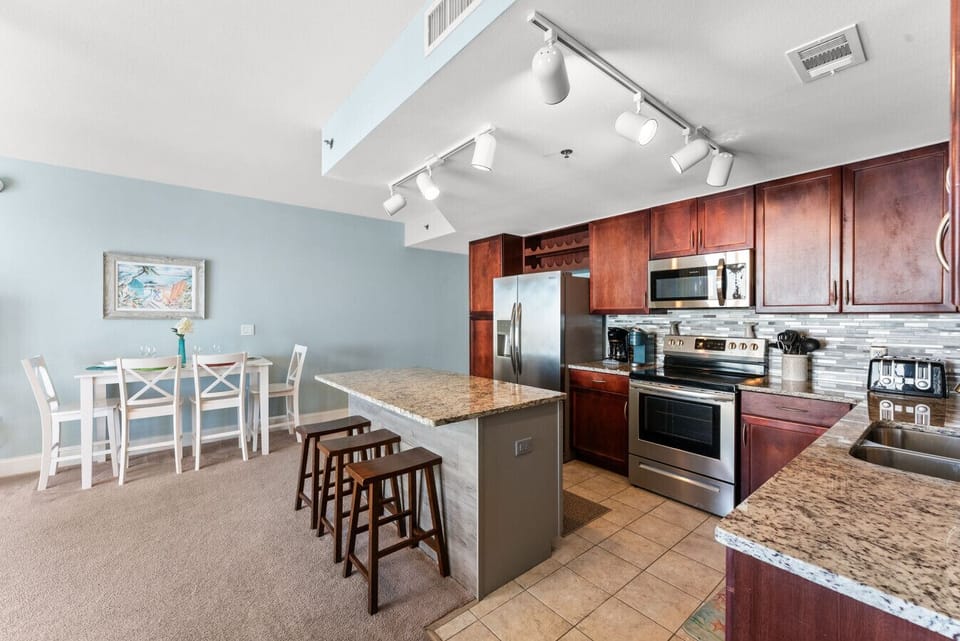 Fully Stocked Kitchen with Ocean Views, Island Bar Seating, Stainless Steel Appliances, Drip Coffee Maker and Keurig