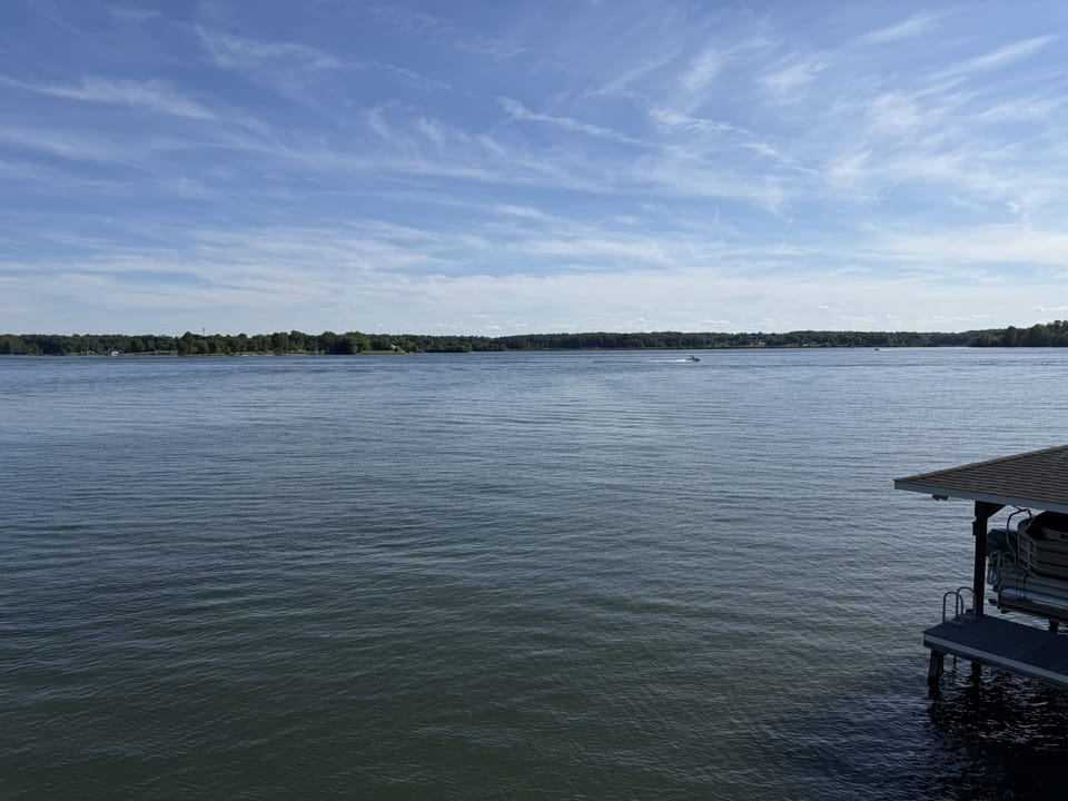 View of the main channel on the lake from upper level of boathouse.