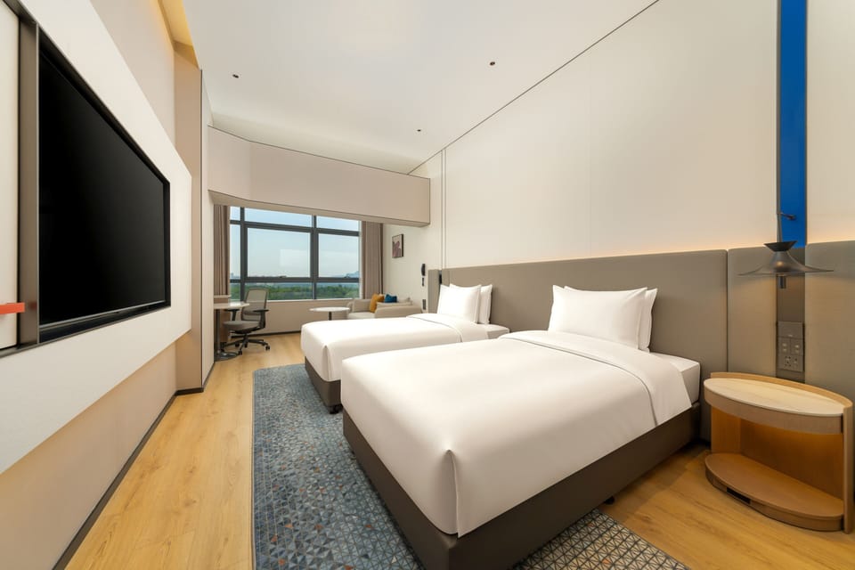 Premium bedding, down comforters, desk, laptop workspace