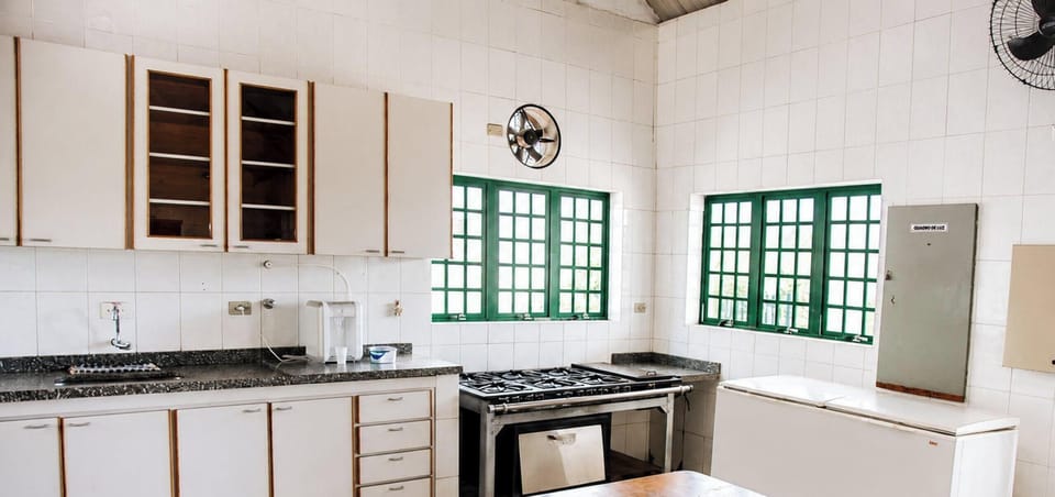 Family Cottage | Private kitchen | Fridge, microwave, cookware/dishes/utensils, dining table